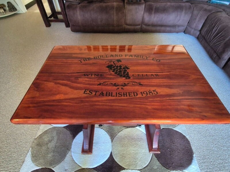 Finished wine barrel coffee table with family winery logo