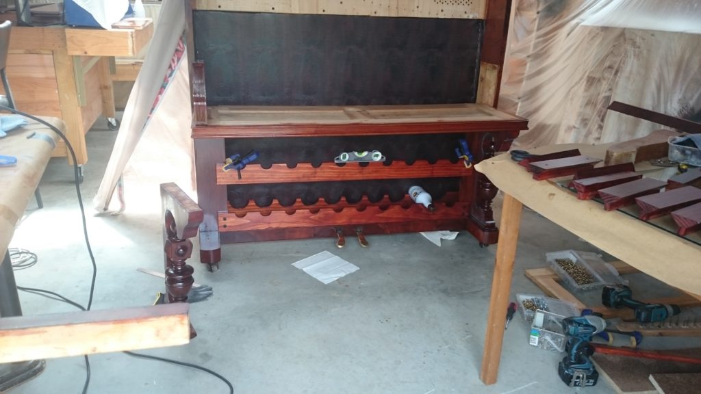 Recycle A Piano into a bar drinks cabinet