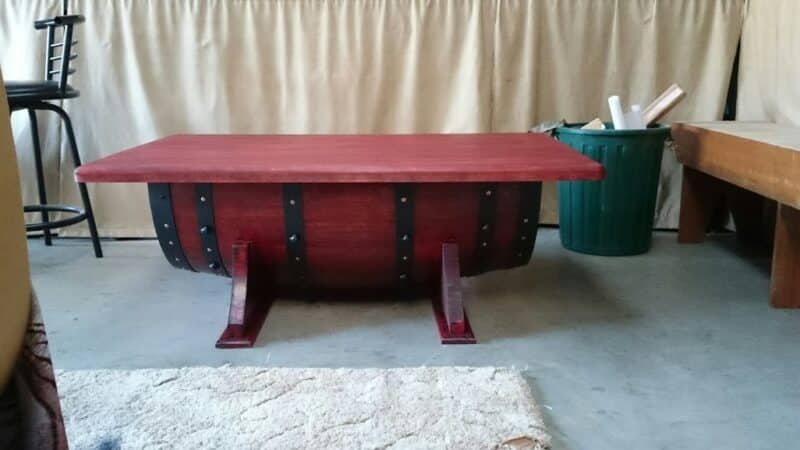 stained half wine barrel with painted bands and stained table top
