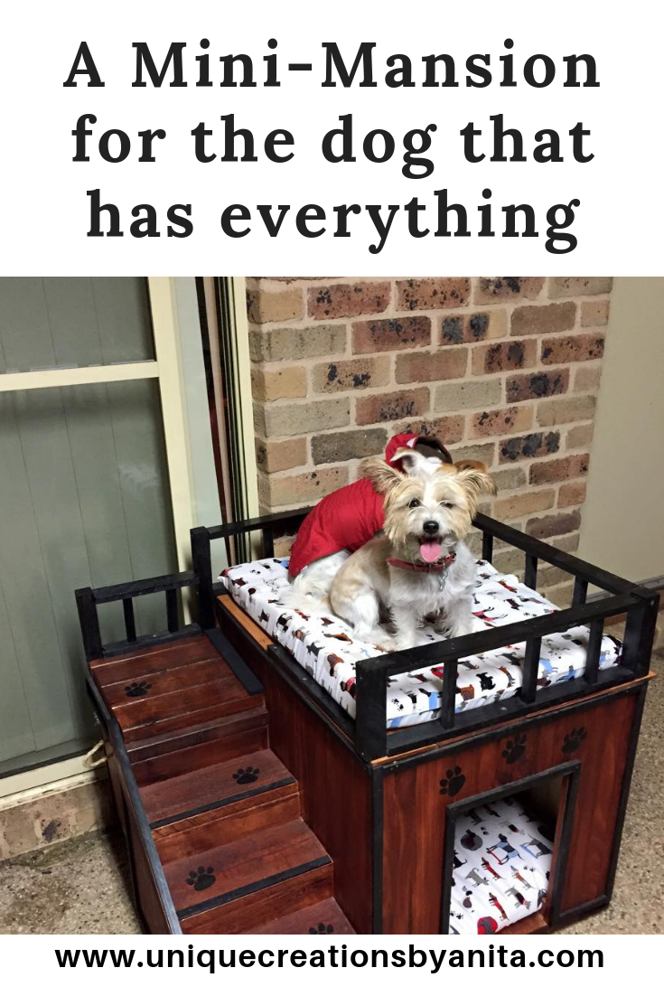 A mini mansion for the dog that has everything