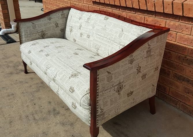 Restored vintage couch - side view.