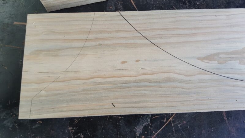 Draw the arched shape onto the wood