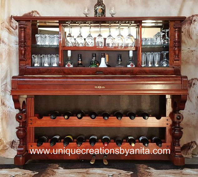 Recycle A Piano into a bar drinks cabinet