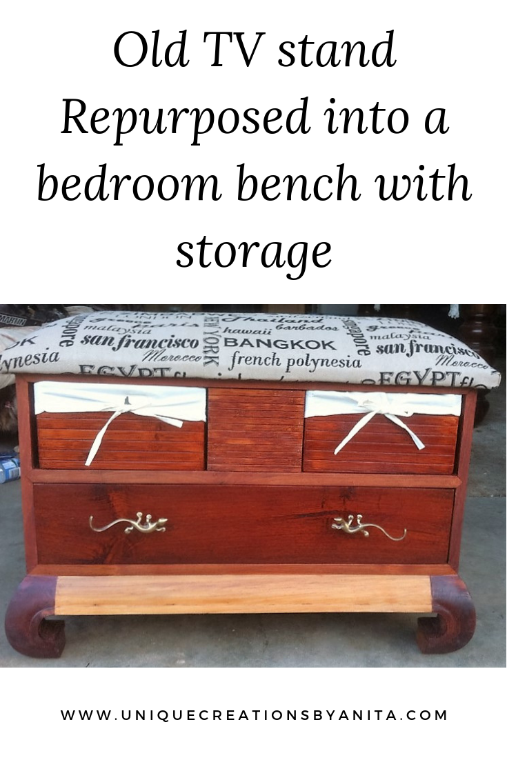 Old TV stand repurposed into a bedroom bench with storage