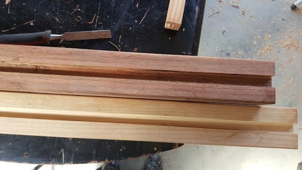 Side and top support beam with groove for doors