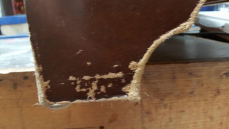 Blown out MDF desk base from moisture and wear.