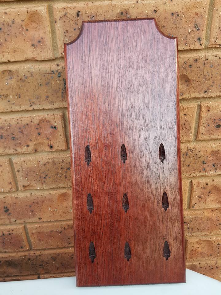 DIY mistake showing planed timber exposing parts of dart holes



