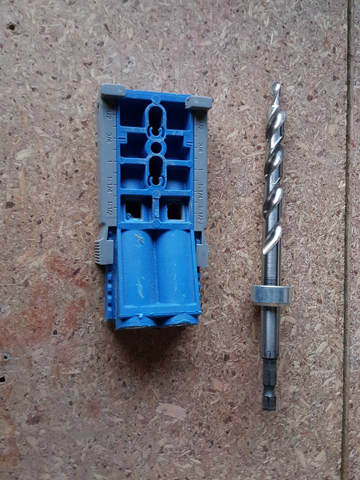 Clamping a pocket hole jig onto timber to drill angled holes for darts


