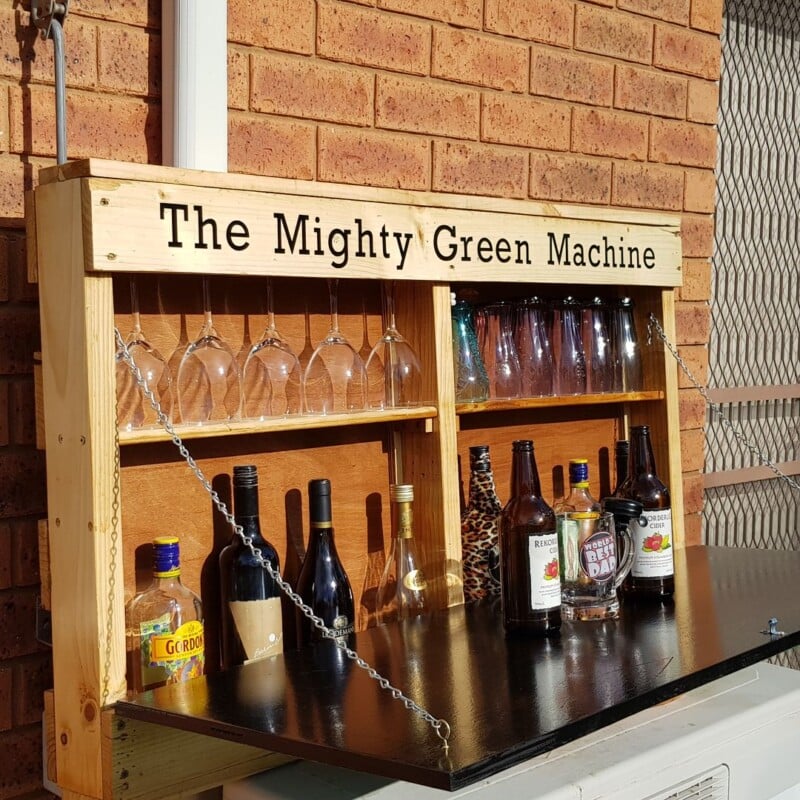 Wall mounted pallet bar with drop down counter. 