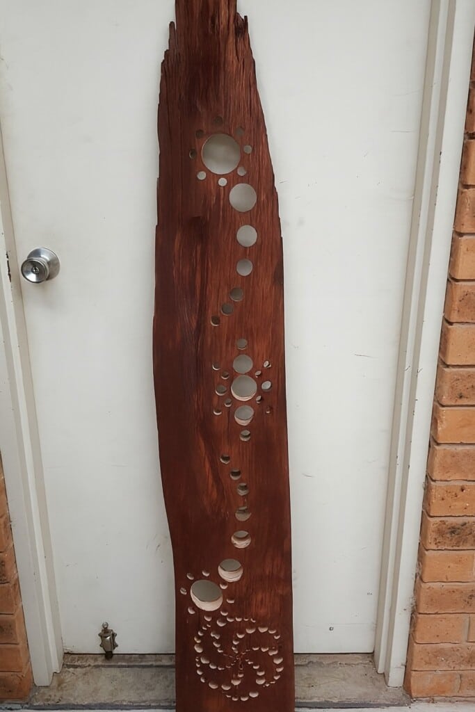 wooden suncatcher with holes before resin poured