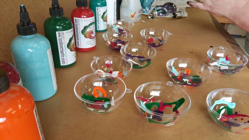 Clear baubles with unicorn spit poured over the surface