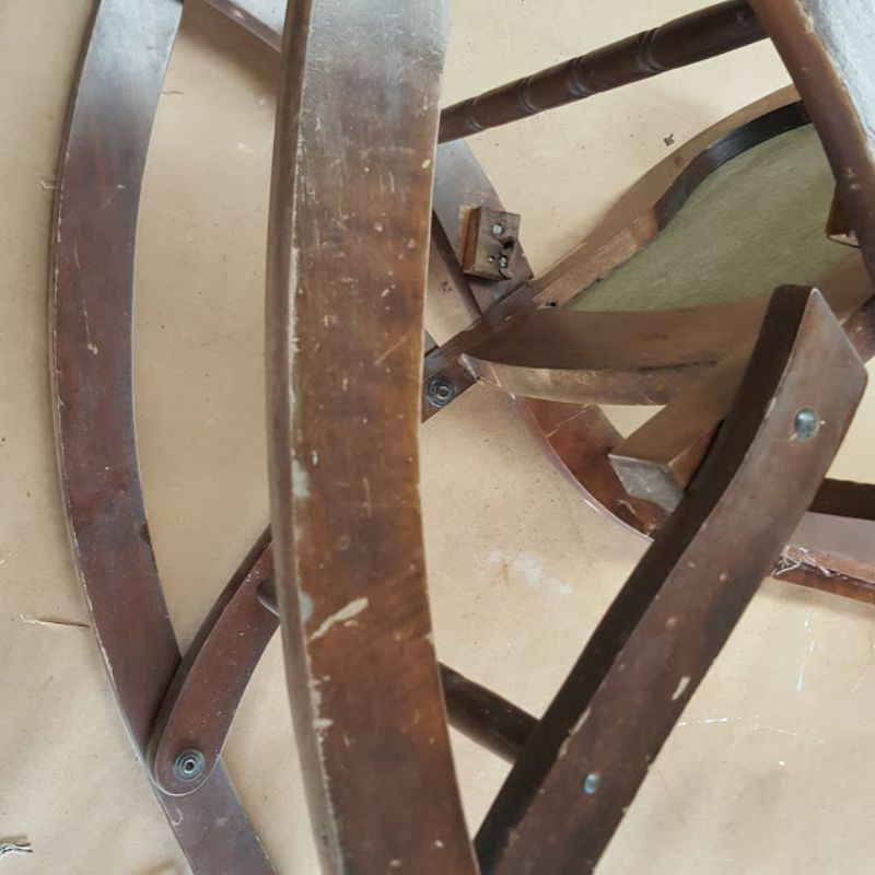 Showing the pop rivets used to assemble the rocking chair.