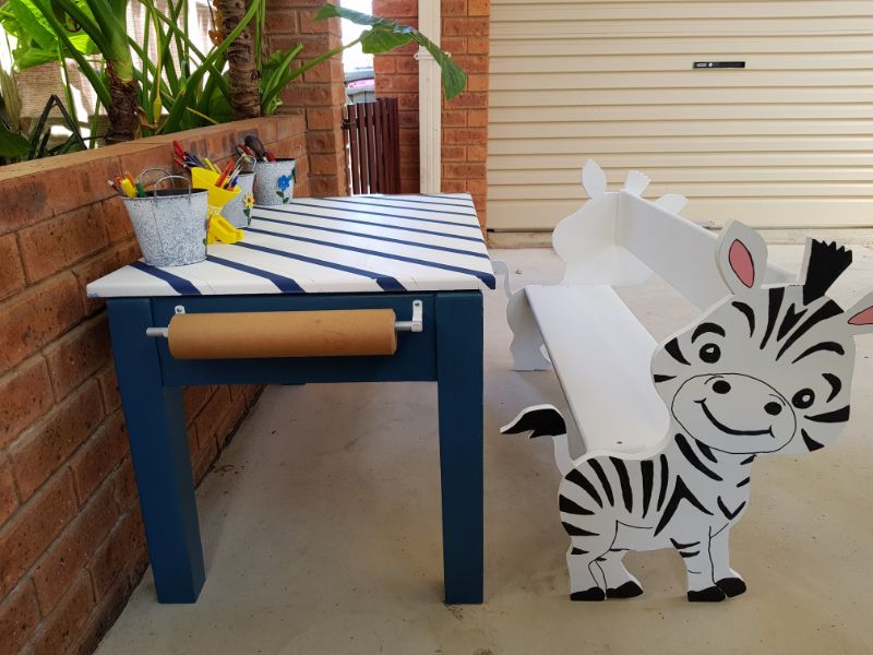 Zebra bench with a toddler craft table