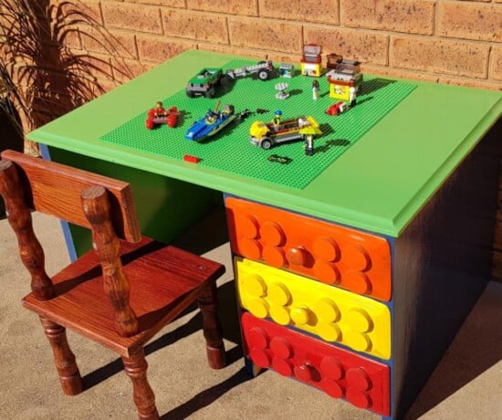 Loose LEGO baseplates on desk for building