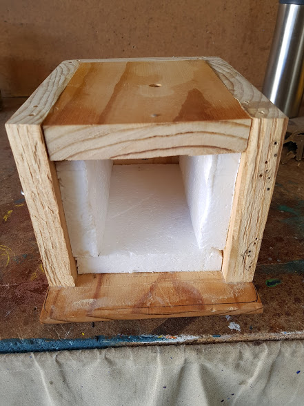 Inside view showing Styrofoam insulation fitted to the box.