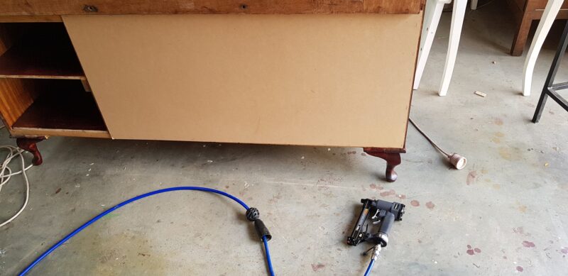 New plywood backing added to back of dresser