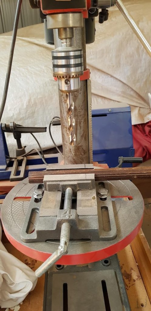 Wooden down in drill press.