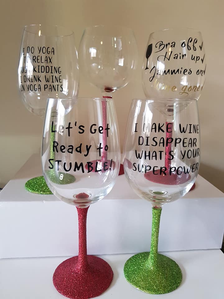 DIY glitter wine glasses with vinyl sticker quotes.