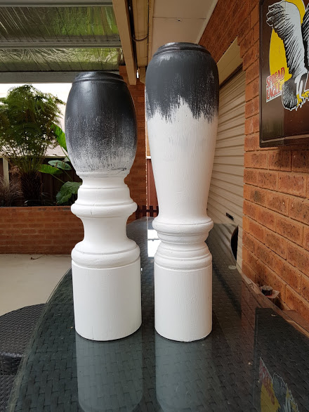 Dry brushing white chalk paint lightly over the candlestick to create texture.