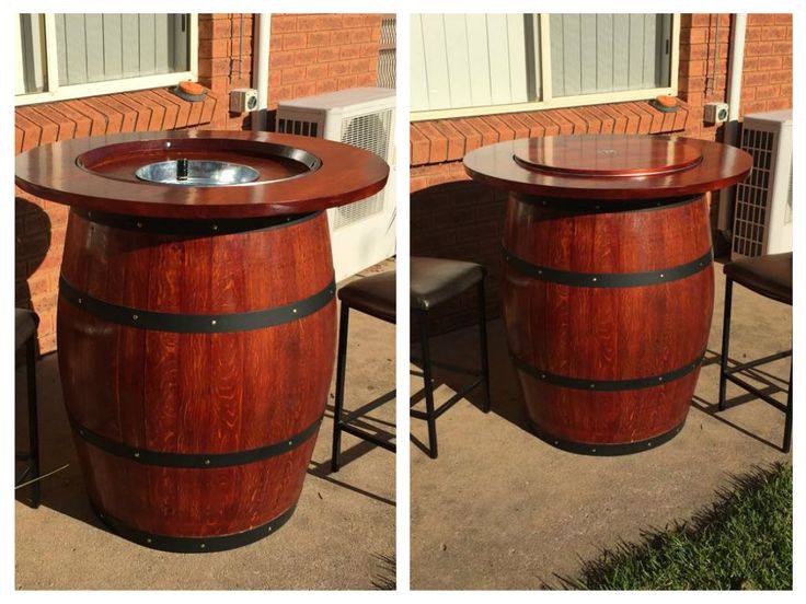 Wine barrel table with wine bucket