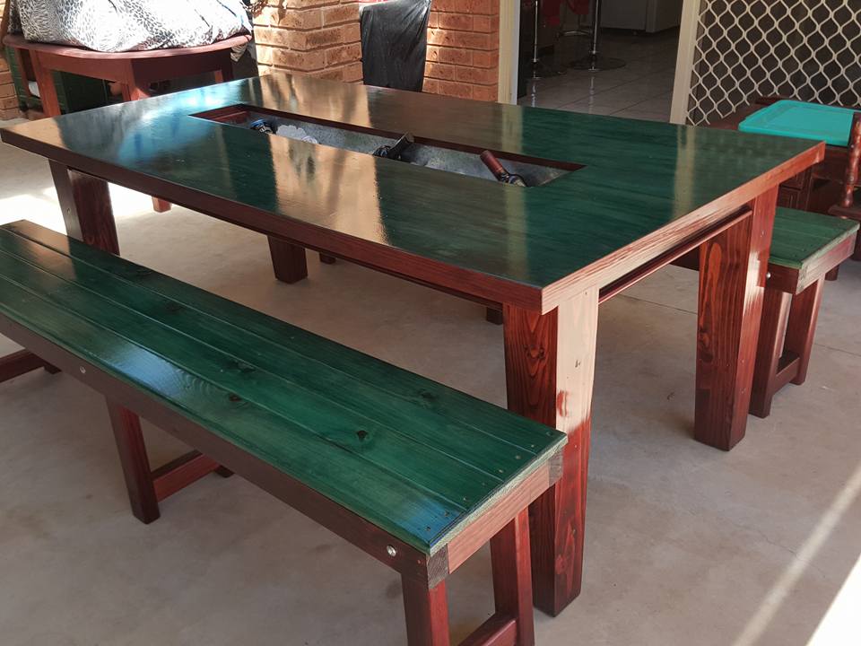 Large table with ice trough with table top stained with Unicorn SPiT.