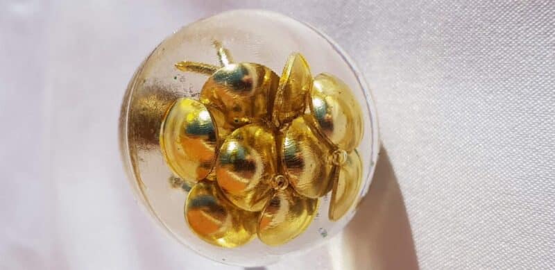 DIY resin knob made using thumbtacks for a modern, industrial look.