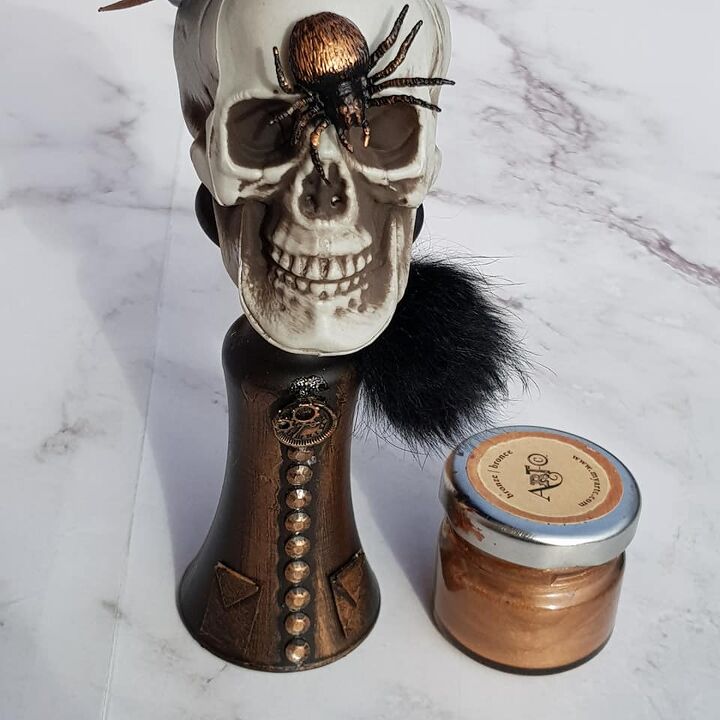 Decorated Halloween skull with bronze wax paste.