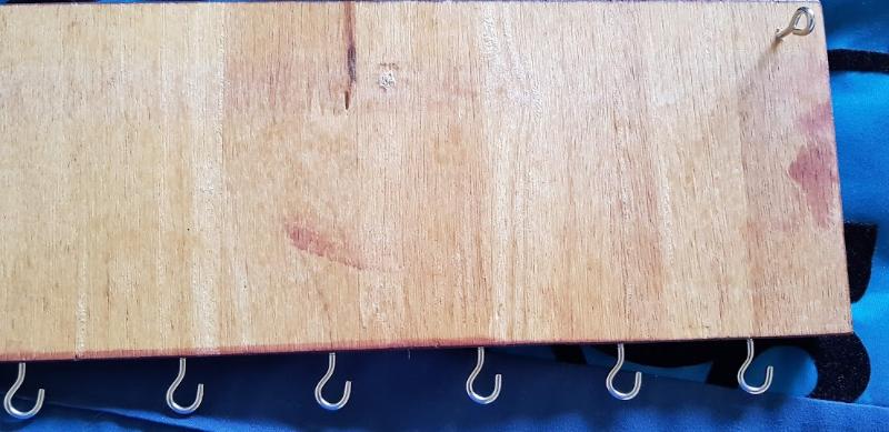 Hooks added to the bottom of the wood
