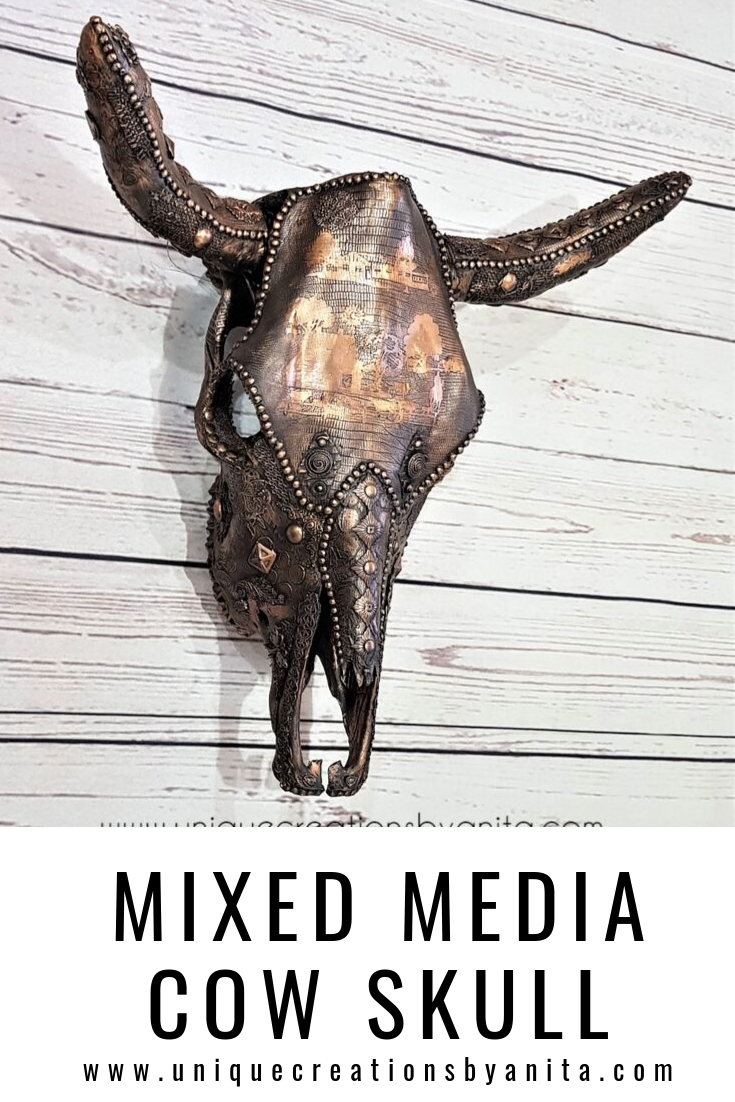 Mixed media cow skull