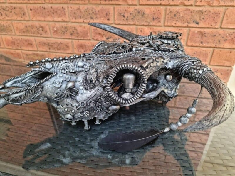 Steampunk themed mixed media art cow skull- side view