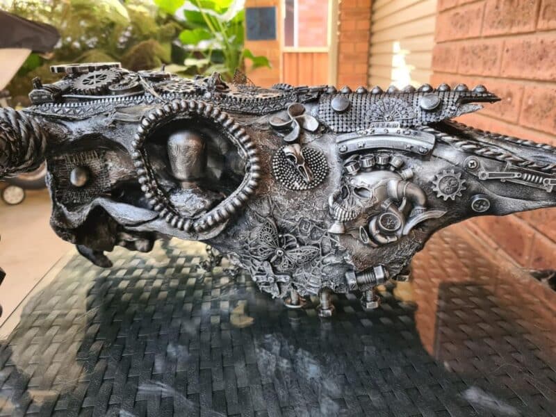 Steampunk themed mixed media art cow skull- front view