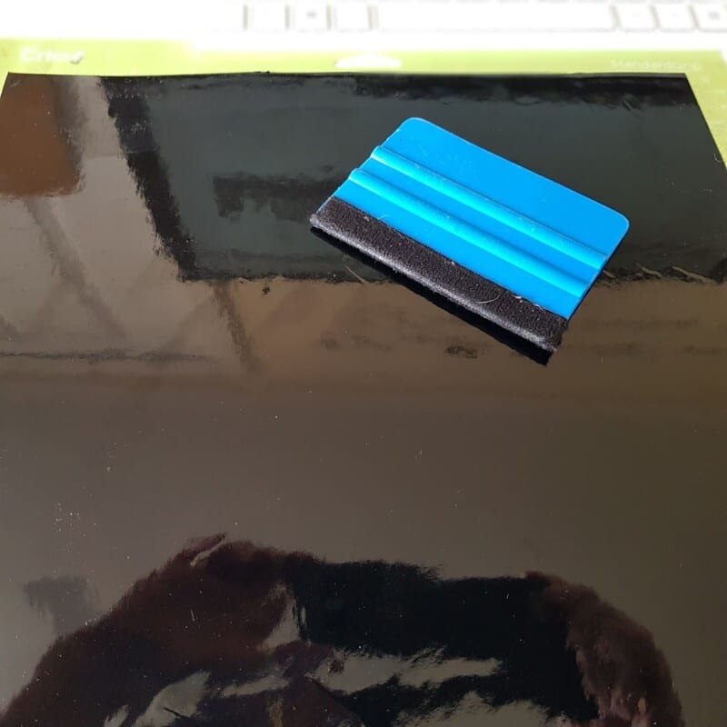 Black vinyl on cricut mat.
