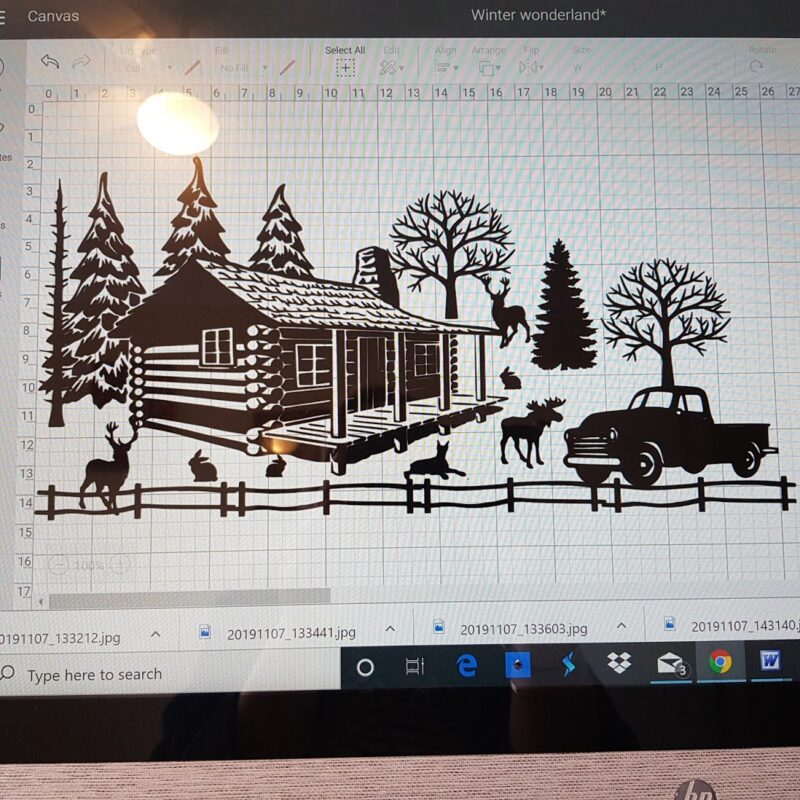 Cabin scene designed in Cricut design space.