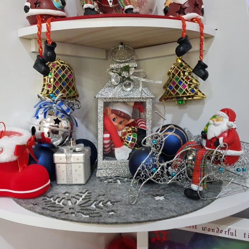 Finished Corner Christmas Tree Shelf styled with festive décor- bottom