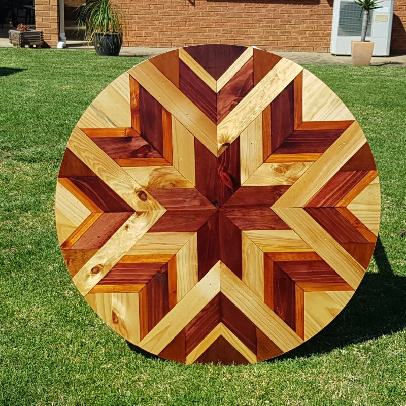 Large round wooden barn quilt
