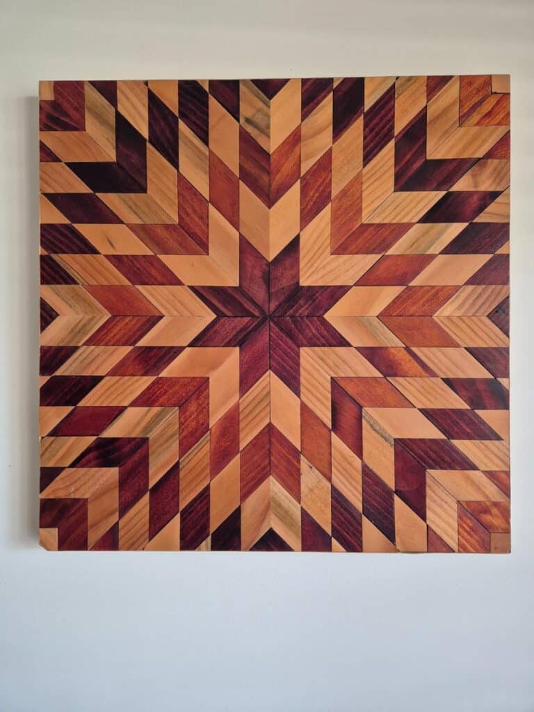 Repeating star burst barn quilt