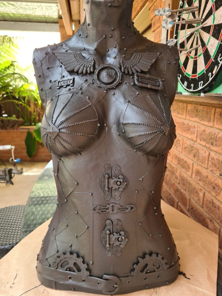 steampunk mannequin painted black- front view