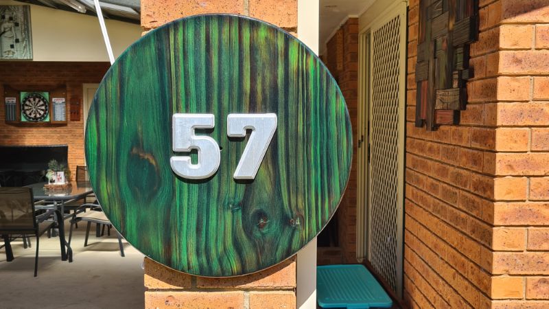 DIY house number made using Shou sugi ban wood burning technique and stained using unicorn spit stain and glaze.