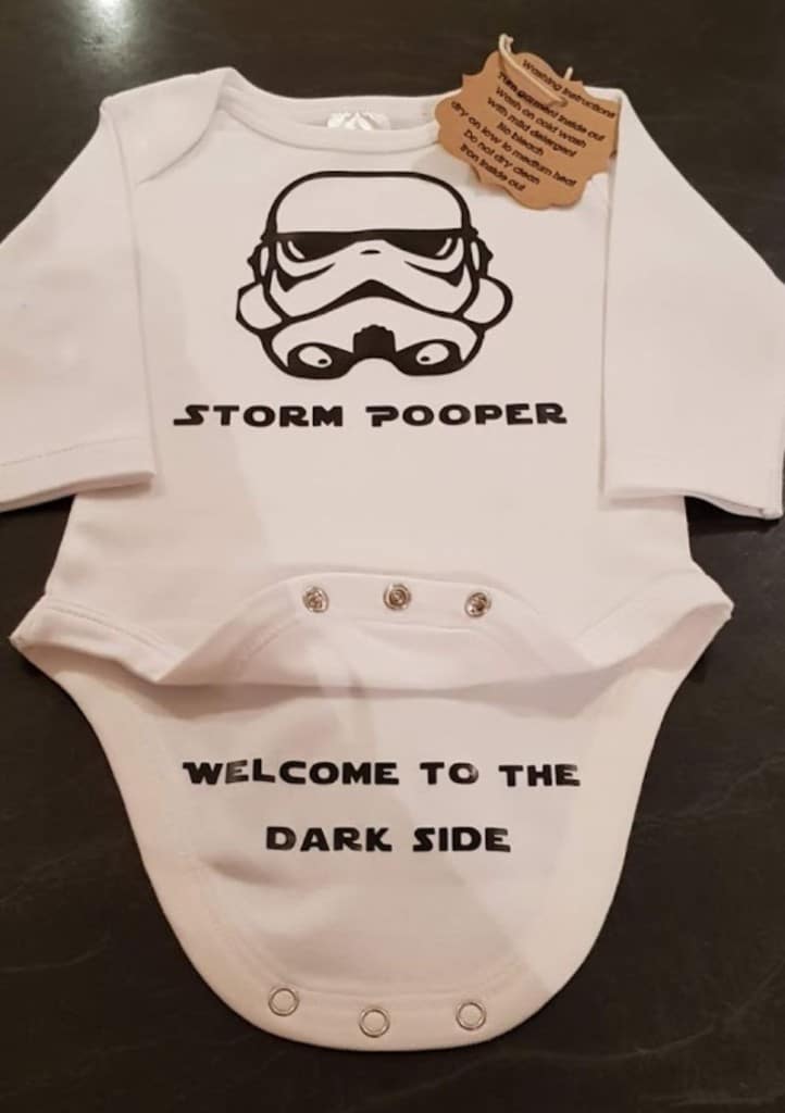 Storm pooper baby onesie made wit Cricut and heat transfer vinyl.