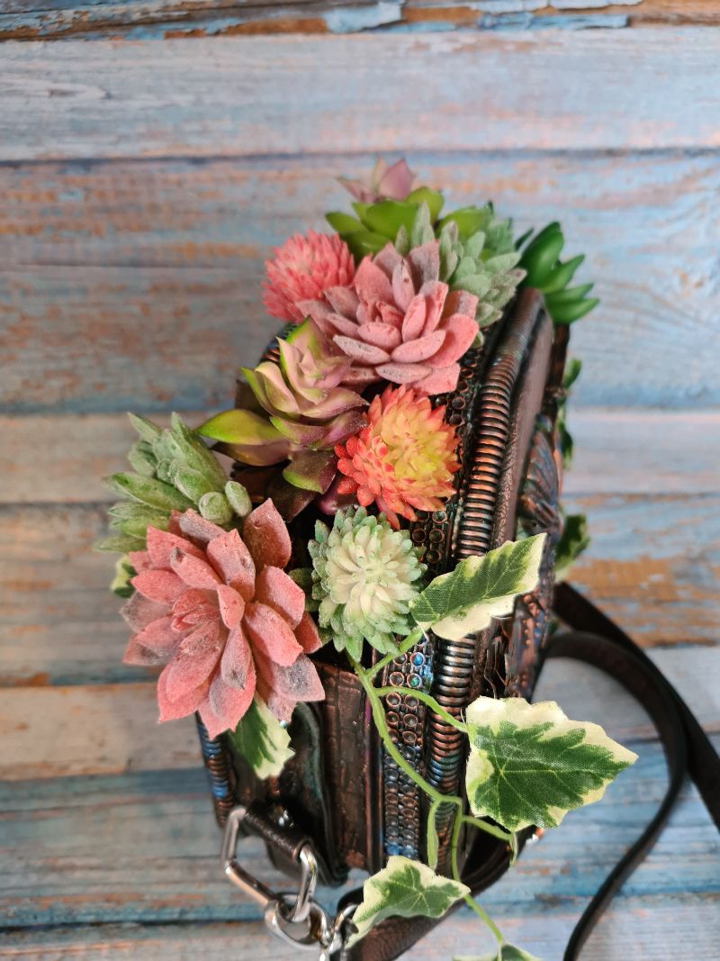 Planter made from a chocolate tin