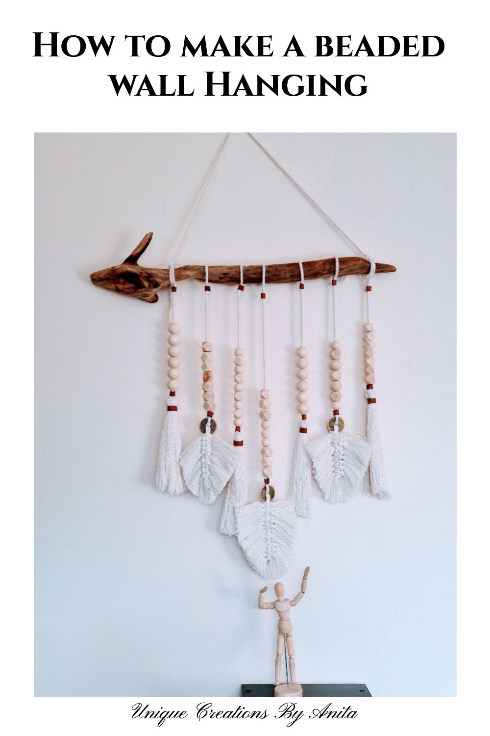 DIY wall hanging made with beads and rope for home decor.