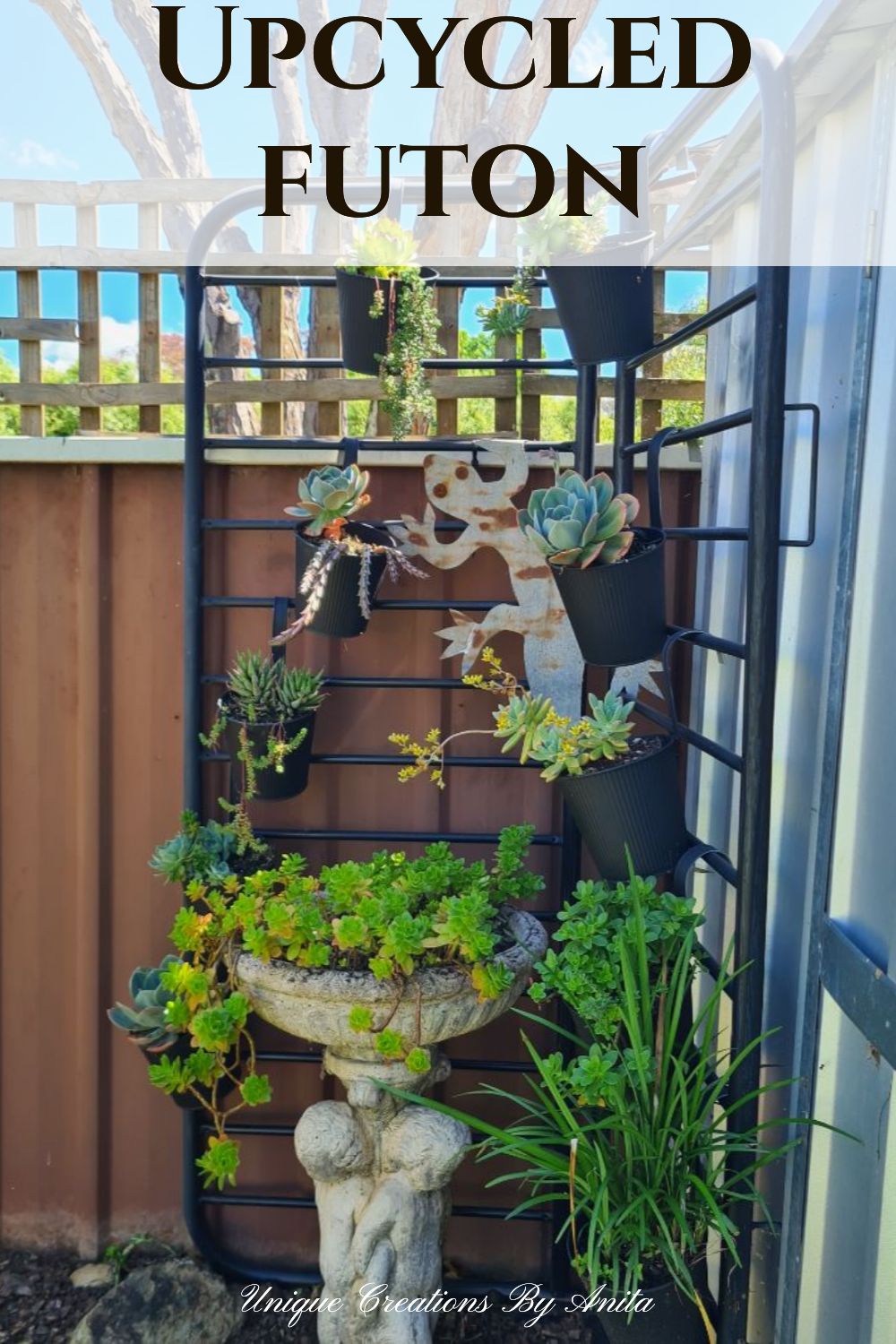 Futon bed frame upcycled into a corner stand for plants in my garden