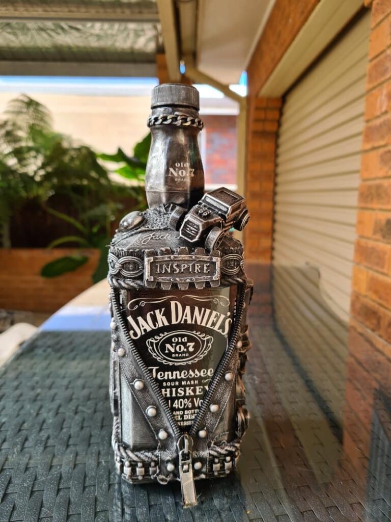 Salvaged zippers from old clothes and bags arranged for use in assemblage - zip up style