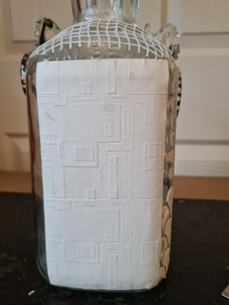 embossed card stock added to bottle