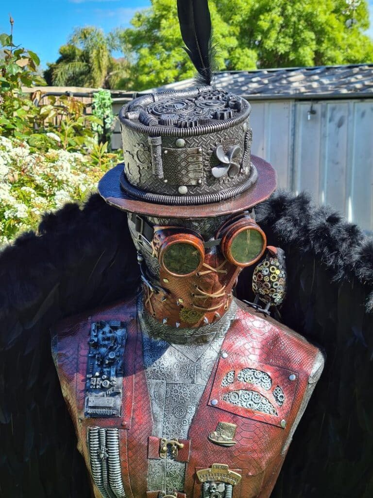 recycled pipes and telephone used on mannequin