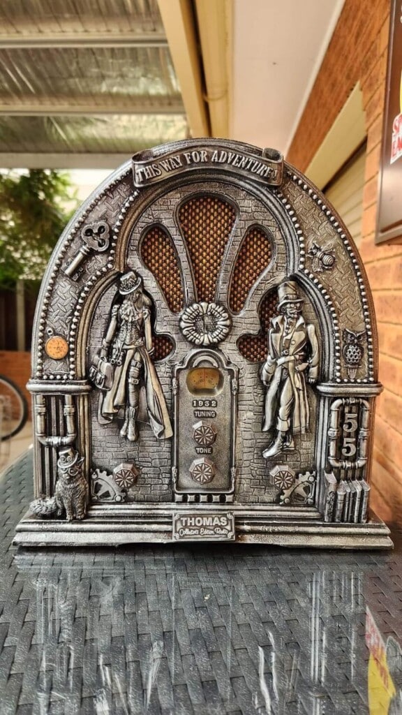 Vintage radio with steampunk assemblage
