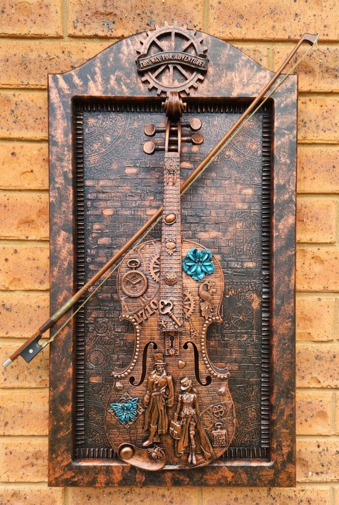 Old violin recycled in assemblage art