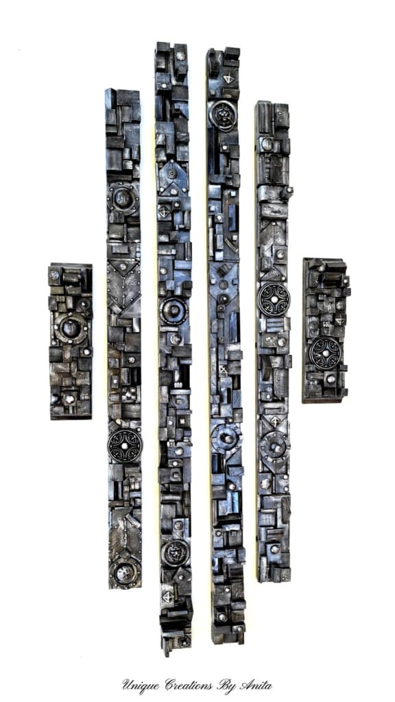 Wooden wall art from wood scraps painted black and silver