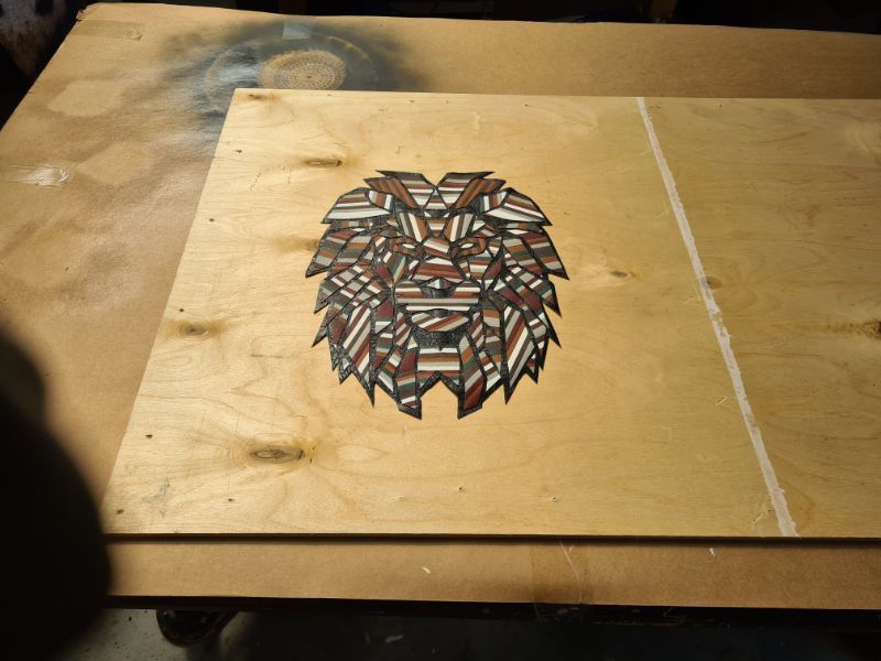 Geometric lion wall art made from scraps of leather