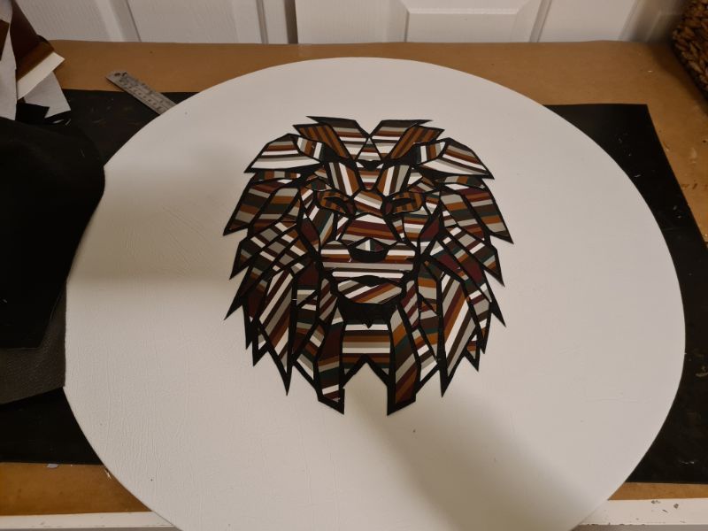 Geometric lion wall art made from scraps of leather